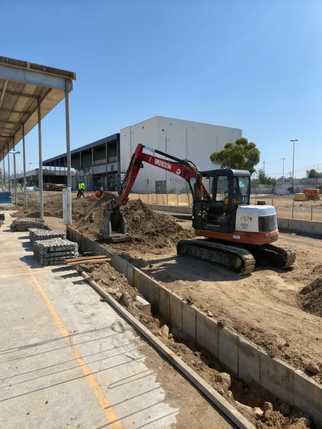 A high-resolution image of a modern excavator on a construction site, showcasing its robust design and capabilities.